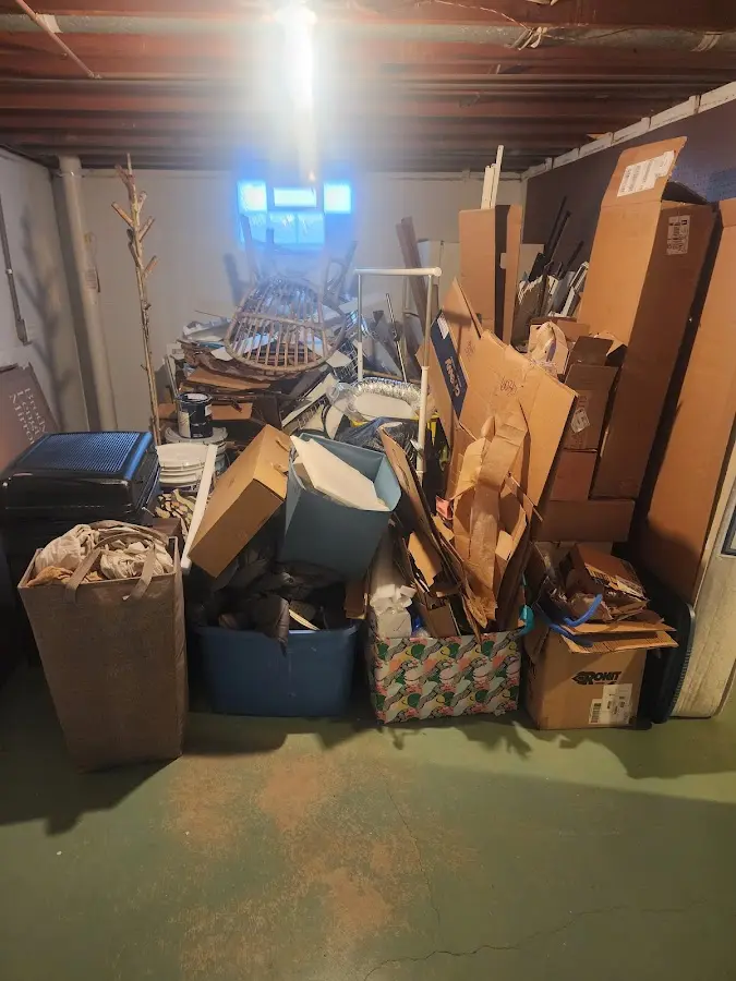 Roll-off dumpster container at job site for Cleanout Dumpster Rental in Harwich